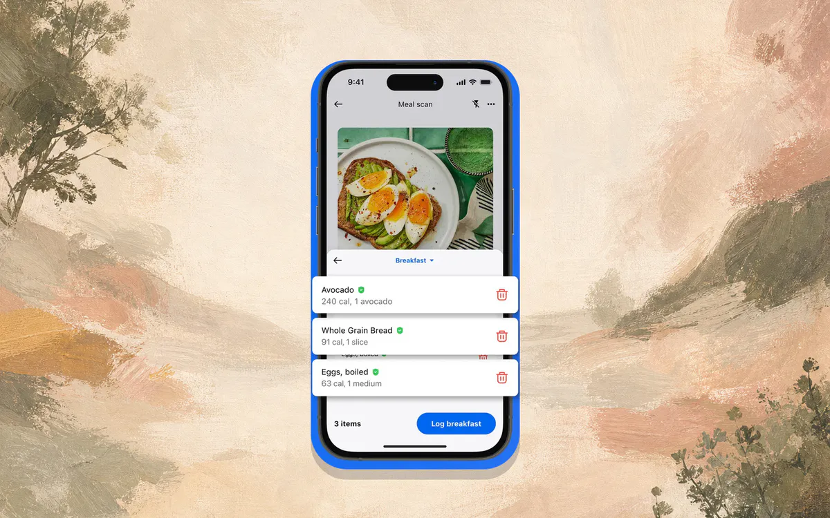 Official MyFitnessPal App Store Meal Scan screenshot on a full-bleed warm landscape art background